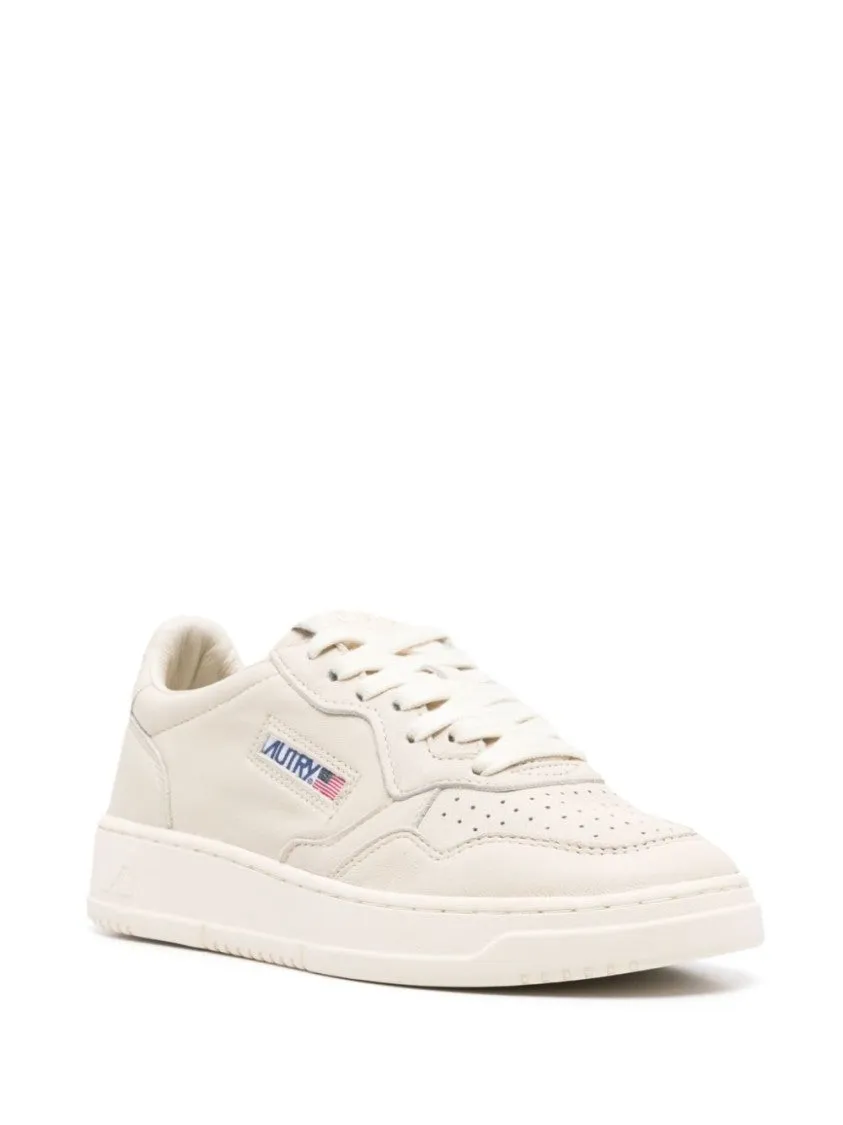 Beige Low-Top Sneakers With Perforated Detailing And Cushioned Sole