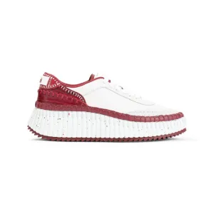 Red Leather Sneakers With Textured Sole And Elegant Accents