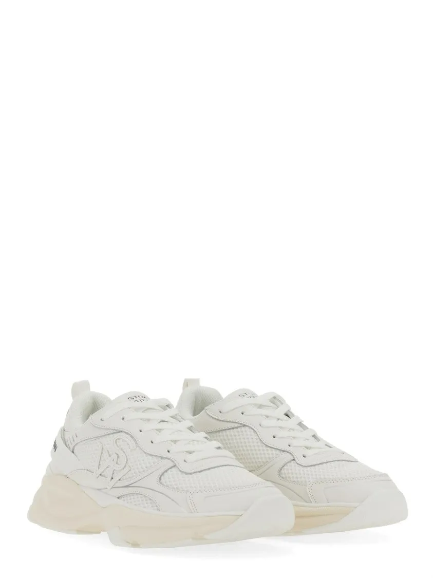 Textured White Sneakers With Prominent Logo