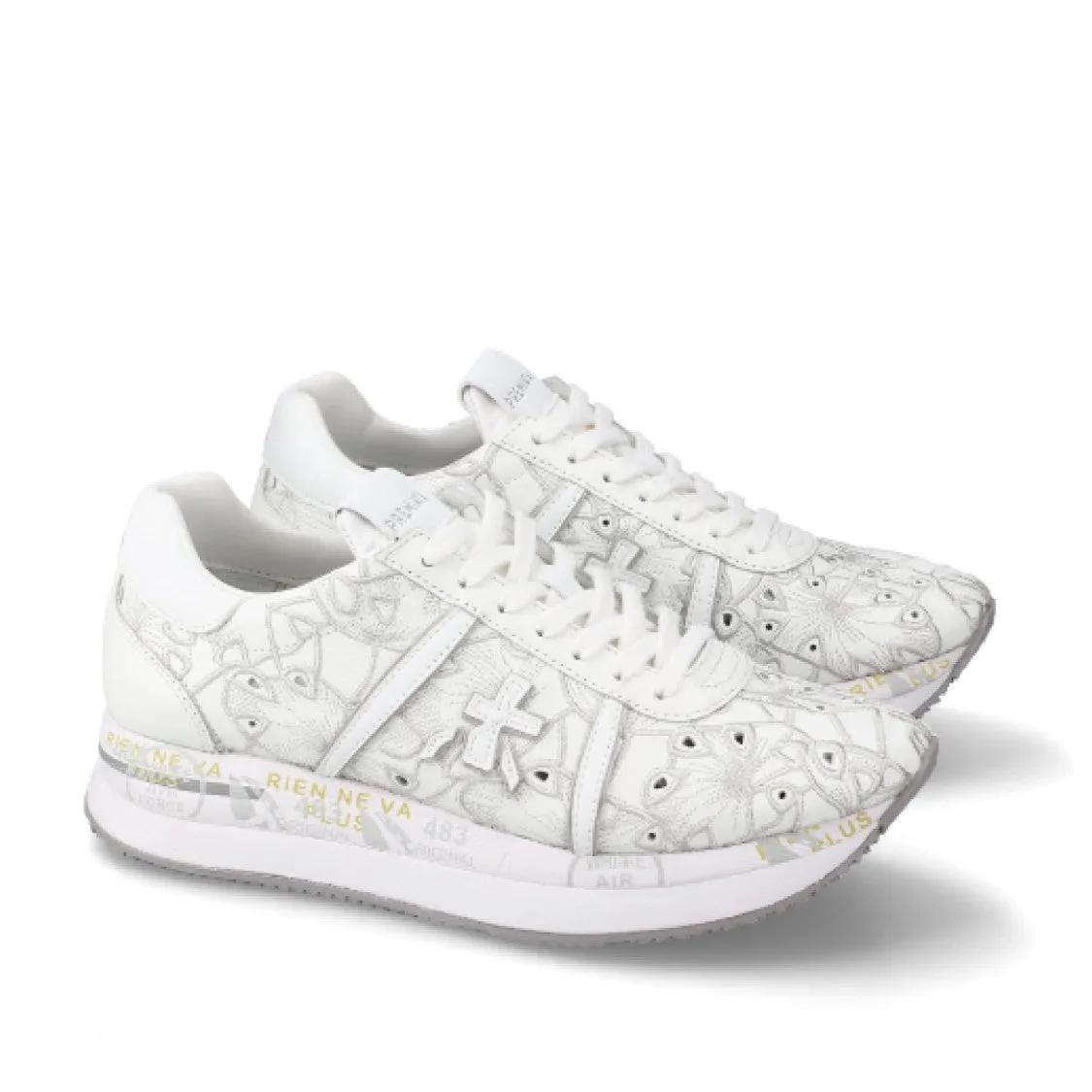 White Lasered Leather Conny Sneakers