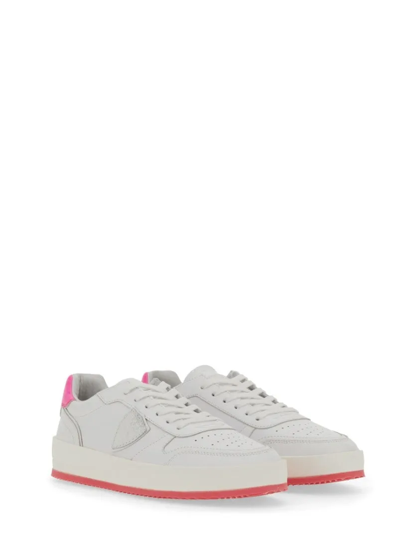 White Sneakers With Contrasting Pink Accents