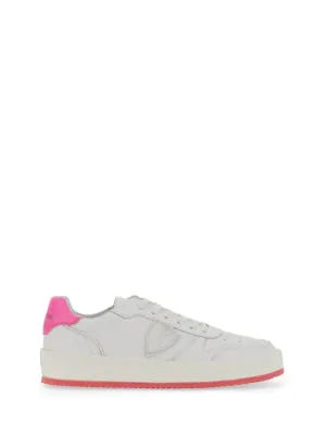 White Sneakers With Contrasting Pink Accents