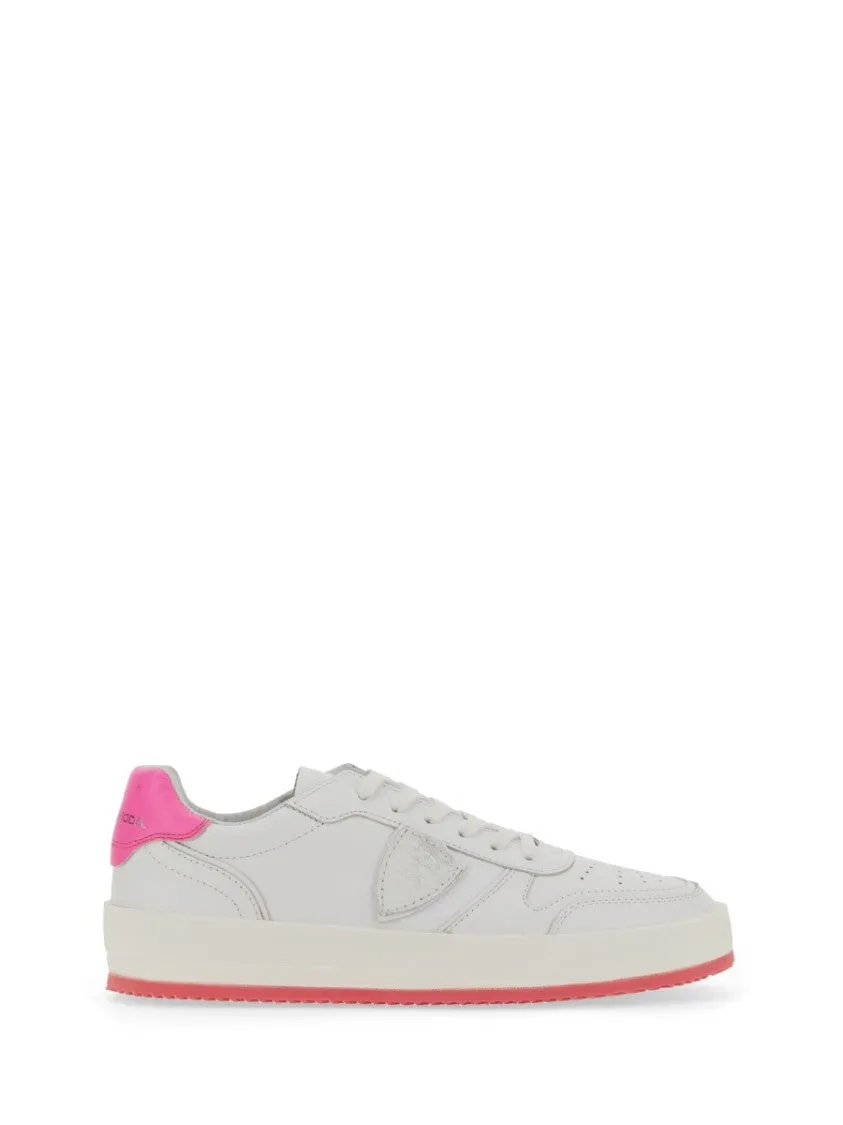 White Sneakers With Contrasting Pink Accents