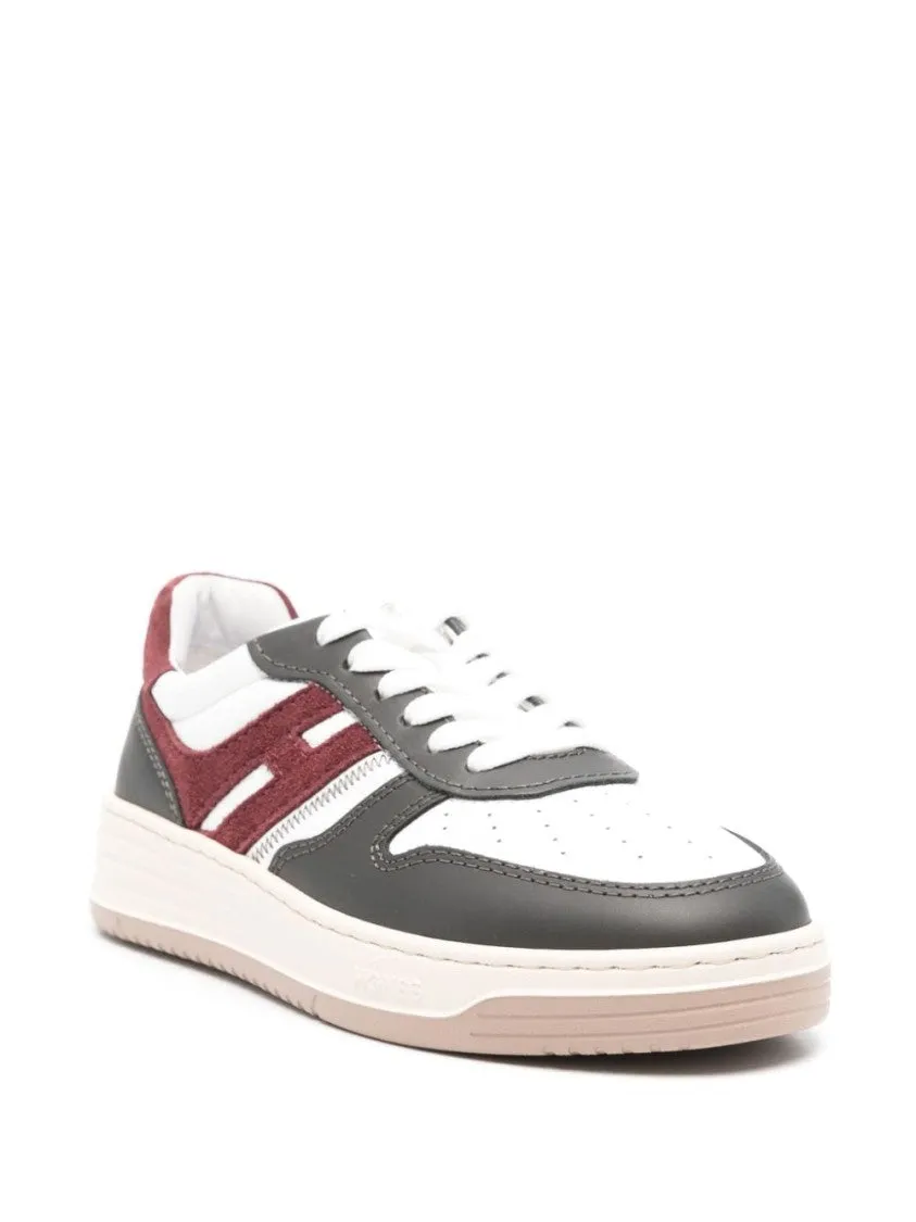 White Sneakers With Textured Accents And Sporty Silhouette